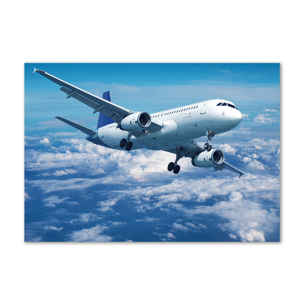 Bild auf glas Ein Flugzeug in den Wolken