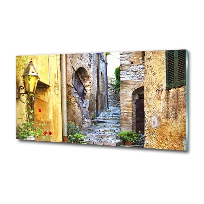 Glasbild Eine charmante Straße