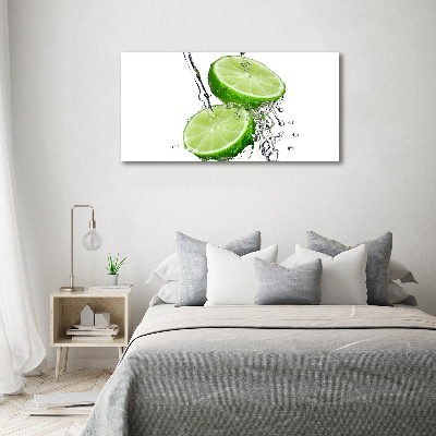 Glasbild Limetten und Wasser