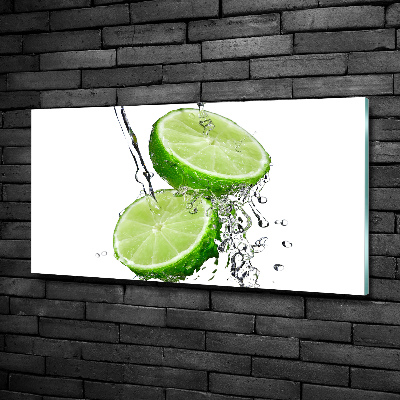 Glasbild Limetten und Wasser