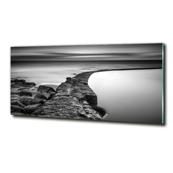 Glasbild Felsiger Strand