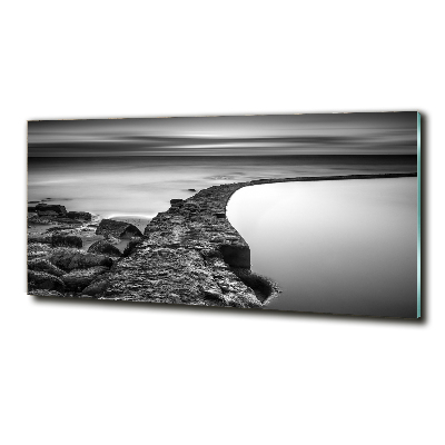 Glasbild Felsiger Strand