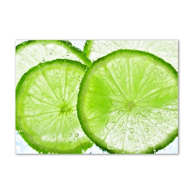 Glasbild Limetten unter Wasser