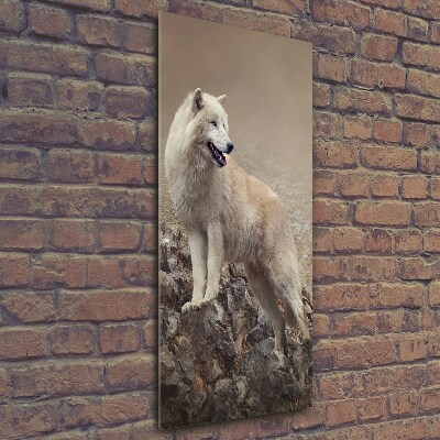 Glasbild vertikales Wolf auf einem Felsen