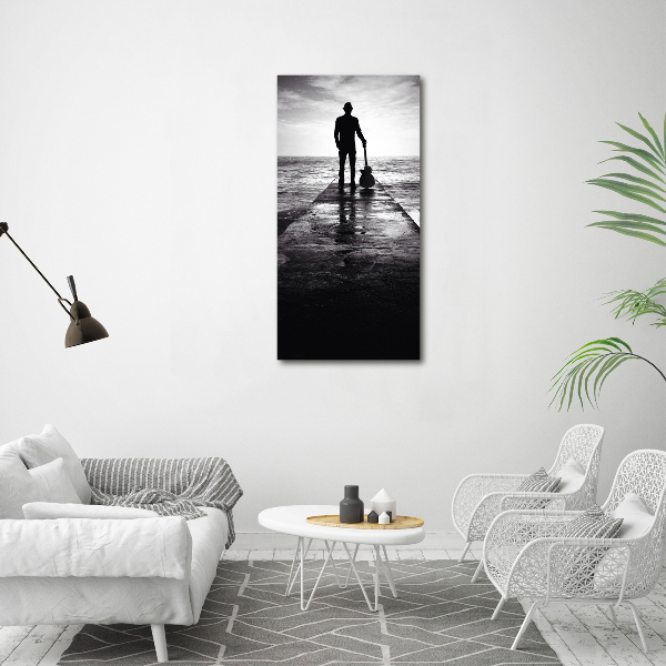 Glasbild vertikales Gitarrist auf dem Pier