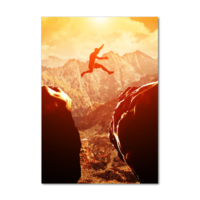 Foto auf glas vertikales Spring über den Abgrund