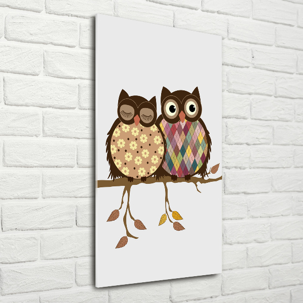 Glasbild vertikales Ein Eulenpaar auf einem Ast