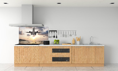 Platte für Küchenrückwand Ein Flugzeug über dem Meer