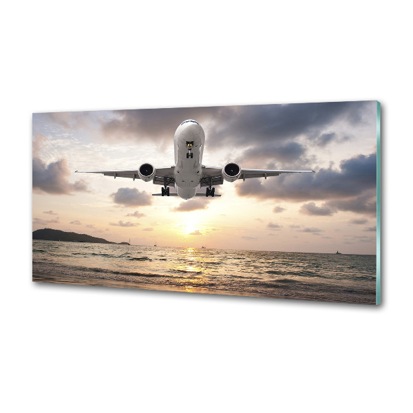 Platte für Küchenrückwand Ein Flugzeug über dem Meer