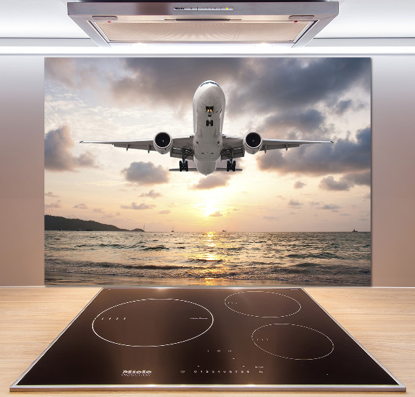 Platte für Küchenrückwand Ein Flugzeug über dem Meer