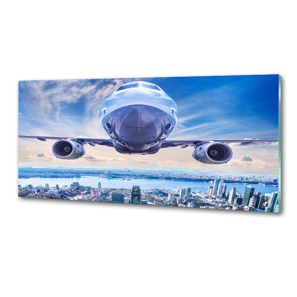 Küchen wandpaneel Ein Flugzeug über der Stadt