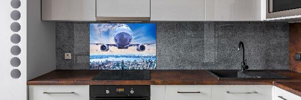 Küchen wandpaneel Ein Flugzeug über der Stadt