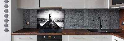 Glasrückwand für die küche Gitarrist auf dem Pier