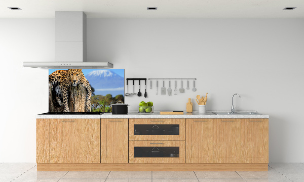 Küchen wandpaneel Leopard auf einem Baumstumpf