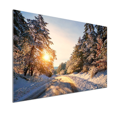 Küchen wandpaneel Eine Straße im Wald im Winter