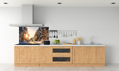 Küchen wandpaneel Eine Straße im Wald im Winter