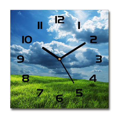 Wanduhr quadratisch Wolken über dem Feld
