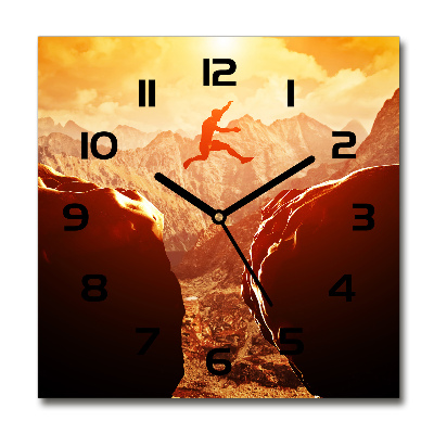 Wanduhr modern quadratisch Spring über den Abgrund