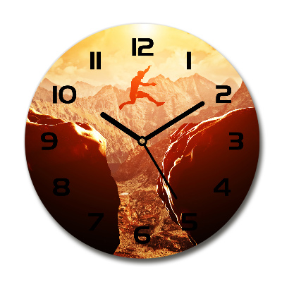 Wanduhr glas rund Spring über den Abgrund