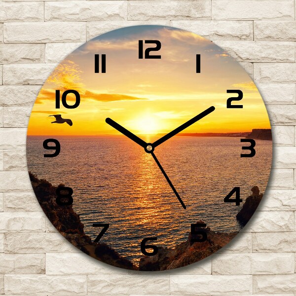 Wanduhr rund Sonnenuntergang am Meer