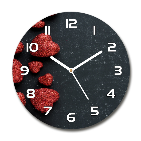 Wanduhr rund Herzen auf dem Brett