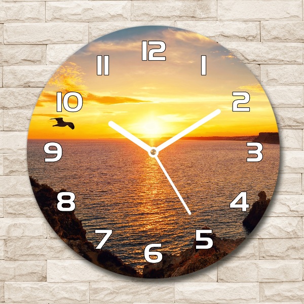 Wanduhr rund Sonnenuntergang am Meer