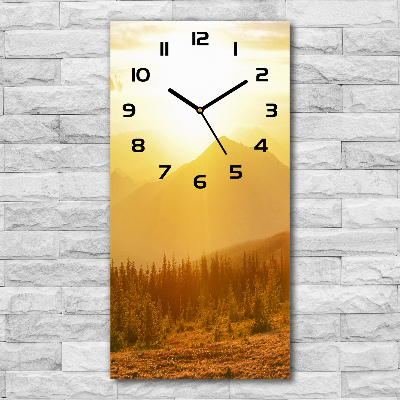 Wanduhr Sonnenuntergang in den Bergen