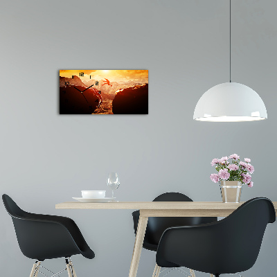 Glasuhr Spring über den Abgrund