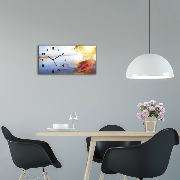 Glasuhr Eine Muschel am Strand