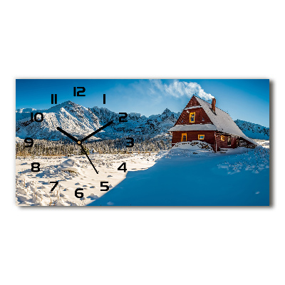 Moderne wanduhr Ein Ferienhaus in den Bergen