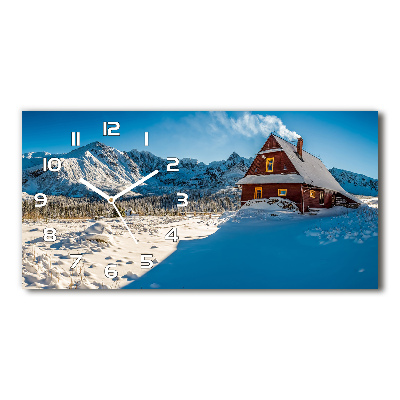 Moderne wanduhr Ein Ferienhaus in den Bergen