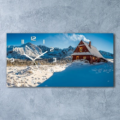 Moderne wanduhr Ein Ferienhaus in den Bergen
