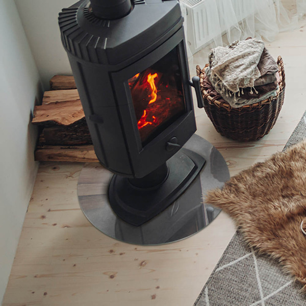 Runde Glasplatte für Kaminofen Betonkonstruktion mit Wirkung