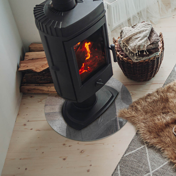 Runde Funkenschutzplatte aus Glas Rohbetonmuster