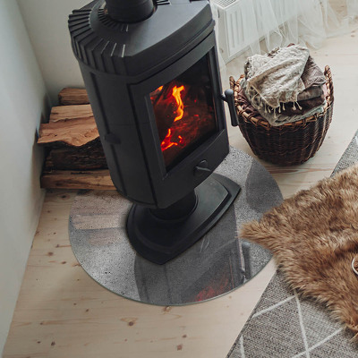 Runde Glasplatte für Kaminofen Sichtbeton im minimalistischen Stil