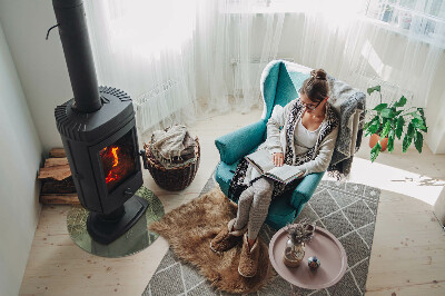 Runde Glasplatte für Kaminofen Tropische Blätter im Hintergrund