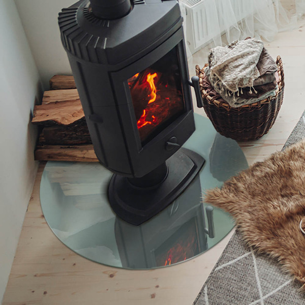 Runde Glasbodenplatte Kamin Marmormotiv in dezenten Farbtönen