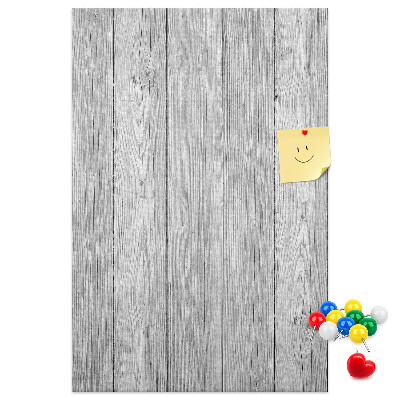 Bedruckte Korkplatte mit Textur von grauen Holzbrettern als Hintergrund