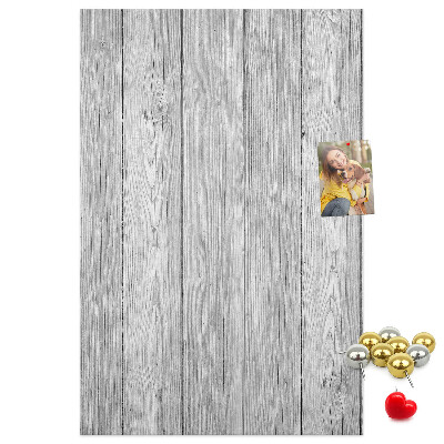 Bedruckte Korkplatte mit Textur von grauen Holzbrettern als Hintergrund
