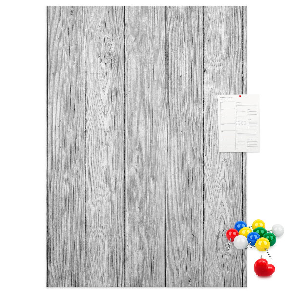 Bedruckte Korkplatte mit Textur von grauen Holzbrettern als Hintergrund