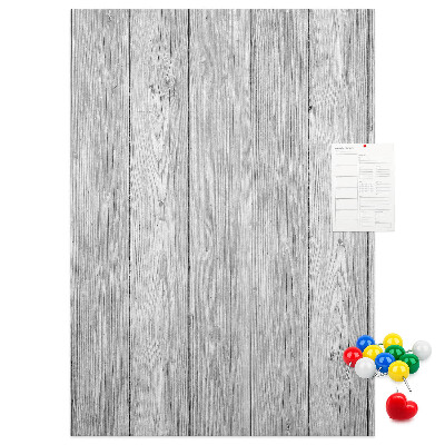 Bedruckte Korkplatte mit Textur von grauen Holzbrettern als Hintergrund