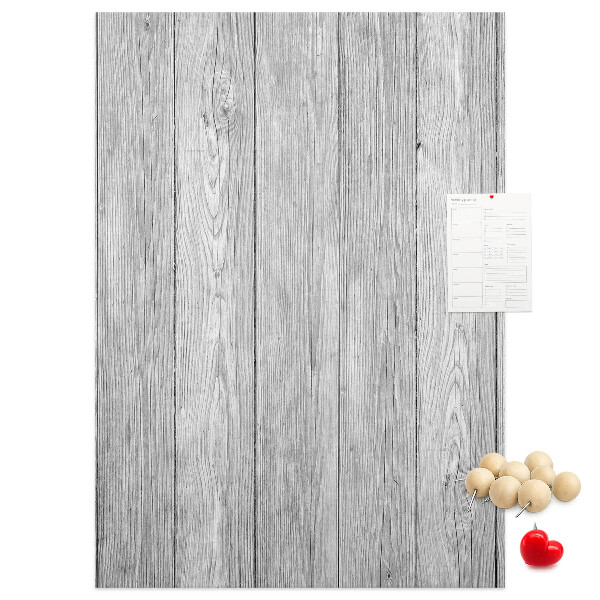 Bedruckte Korkplatte mit Textur von grauen Holzbrettern als Hintergrund