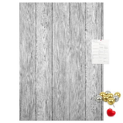 Bedruckte Korkplatte mit Textur von grauen Holzbrettern als Hintergrund