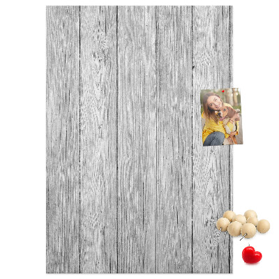 Bedruckte Korkplatte mit Textur von grauen Holzbrettern als Hintergrund