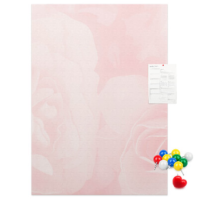 Pinnwand mit Motiv von zarten rosa Rosen im Hintergrund
