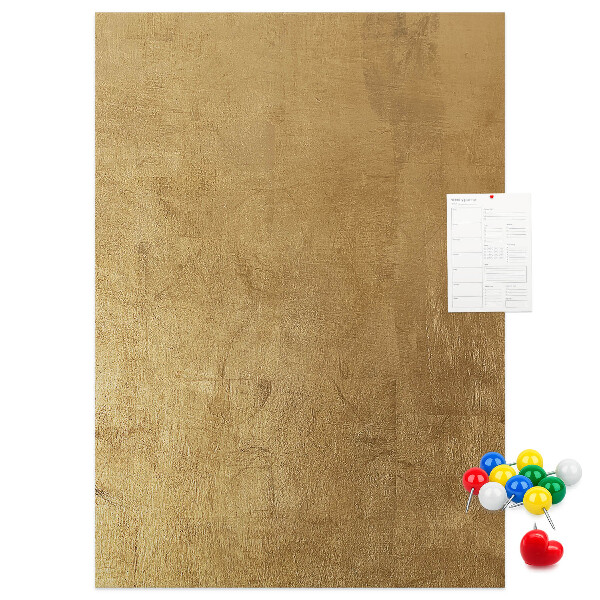 Kork-Pinnwand mit Goldpapier und farbigen Stecknadeln