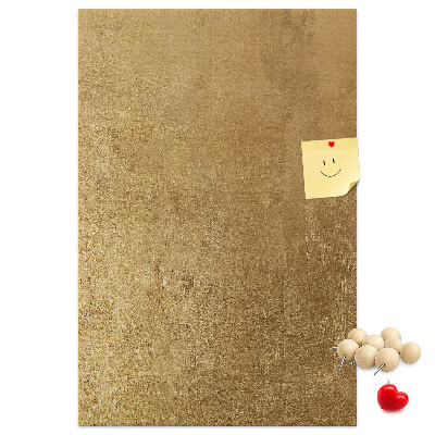 Kork-Pinnwand mit Goldpapier und farbigen Stecknadeln