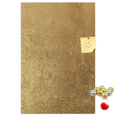 Kork-Pinnwand mit Goldpapier und farbigen Stecknadeln