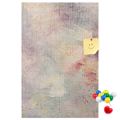 Pinnwand mit zarten Pastellflecken im Hintergrund