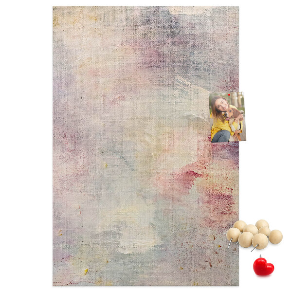 Pinnwand mit zarten Pastellflecken im Hintergrund